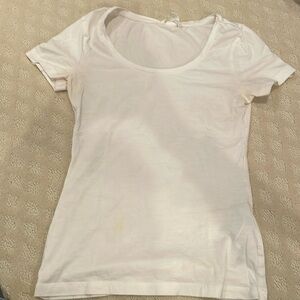 White short-sleeved scoop neck t-shirt.